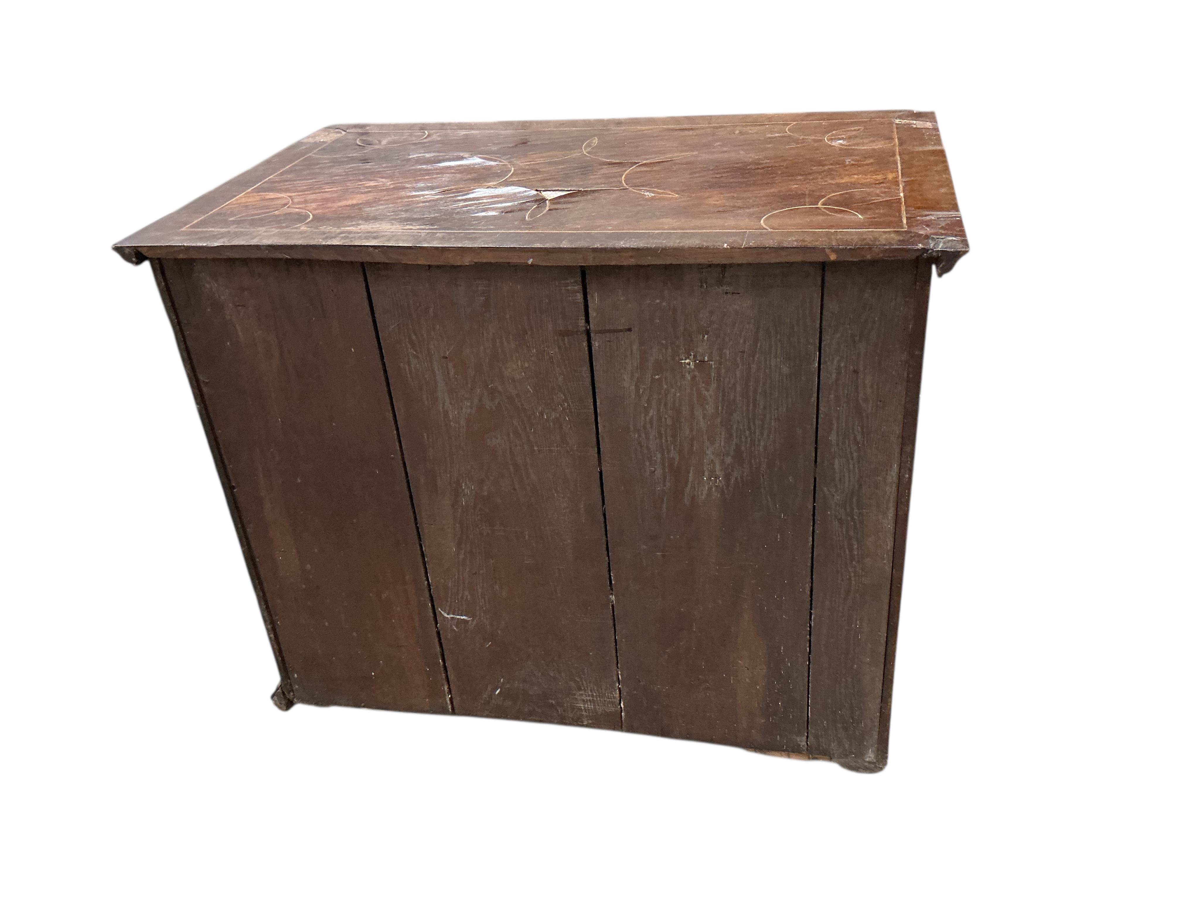 An early 18th century inlaid walnut chest, width 95cm, depth 59cm, height 77cm